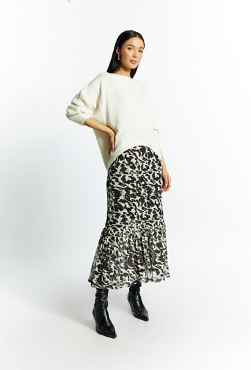 Połyskujący sweter damski