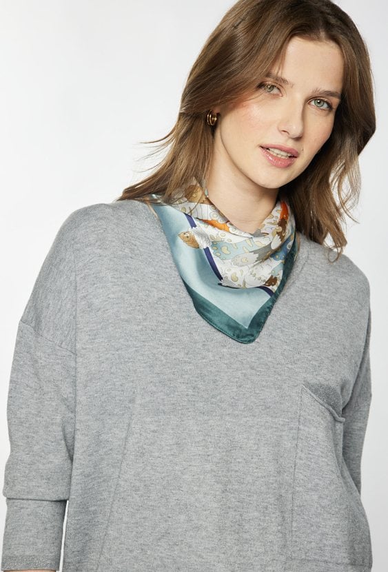 Asymetryczny sweter z kieszonką