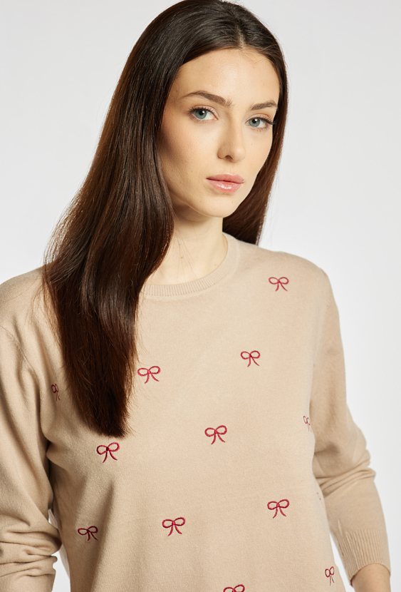 Sweter damski z kokardkami