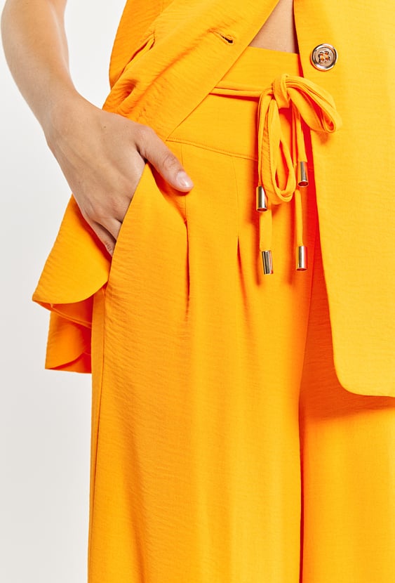 Spodnie damskie z szeroką nogawką