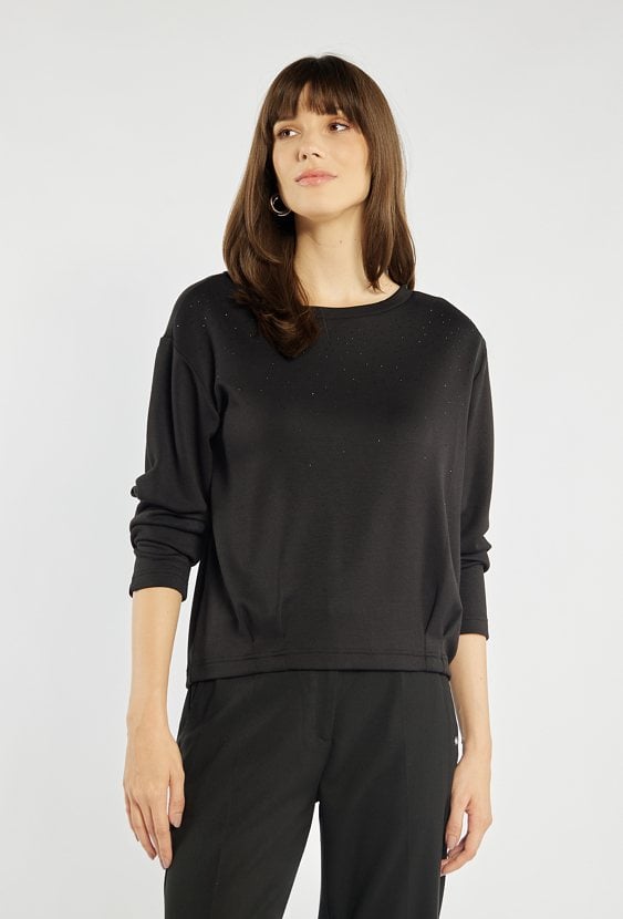 Bluza z błyszczącymi aplikacjami