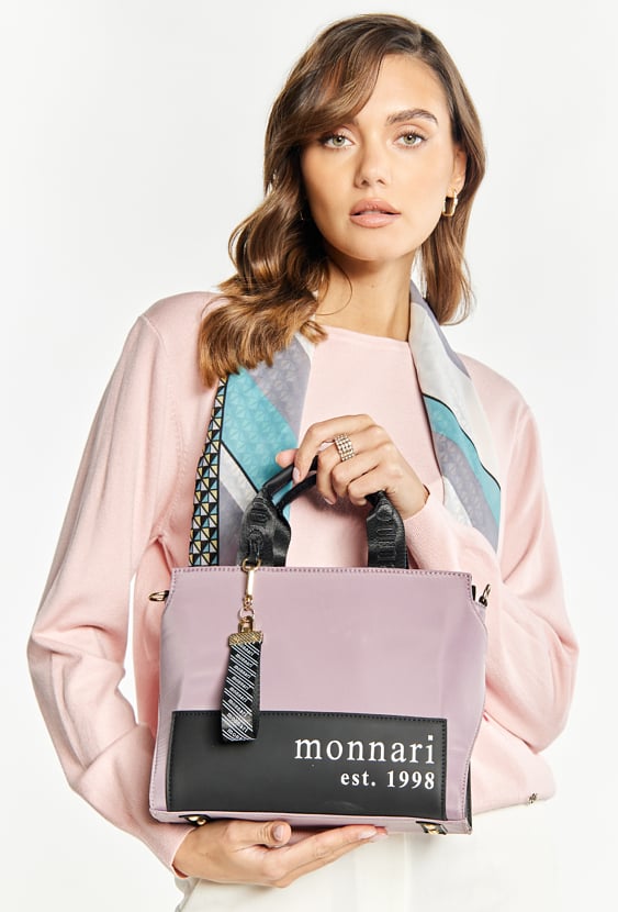 Tekstylna torba damska z przywieszką