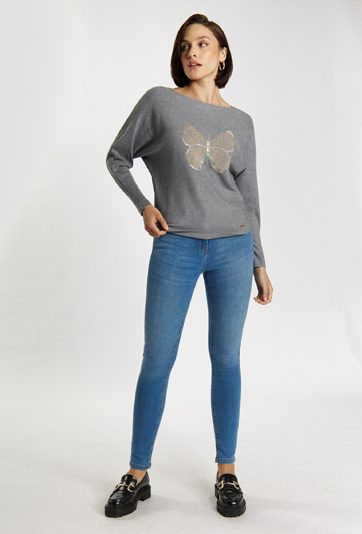Sweter z dżetowym motylem