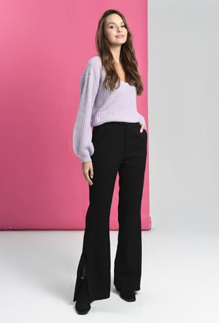 Dzwony z pęknięciem na nogawce