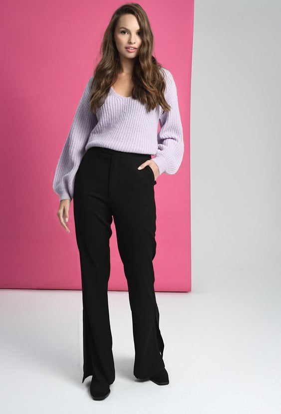 Dzwony z pęknięciem na nogawce