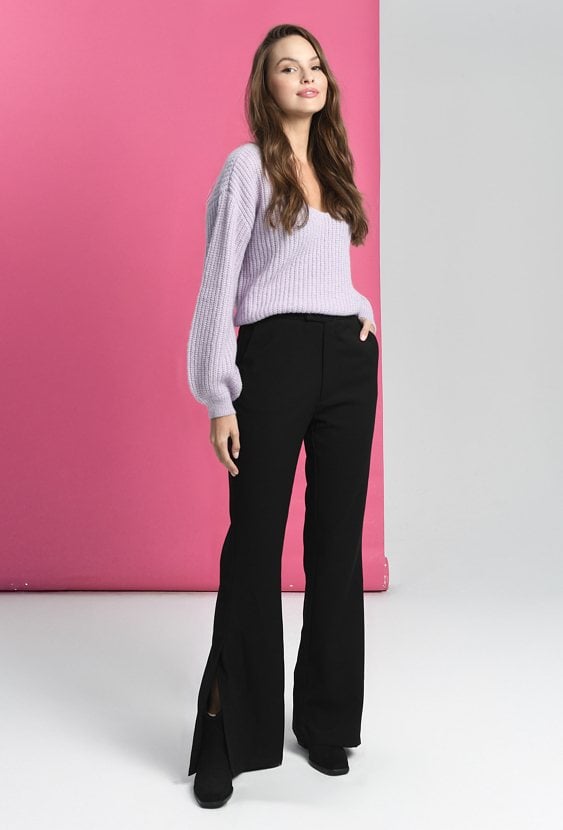 Dzwony z pęknięciem na nogawce