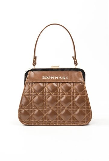 Mały kuferek z pikowanym panelem