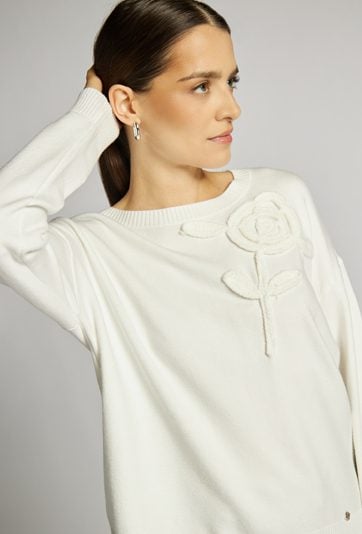 Sweter z kwiatem