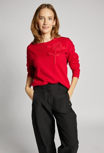 Sweter z kwiatem