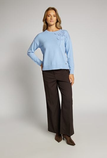 Sweter z kwiatem