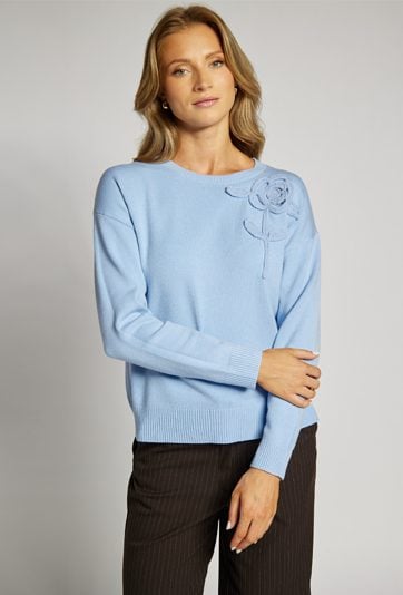 Sweter z kwiatem
