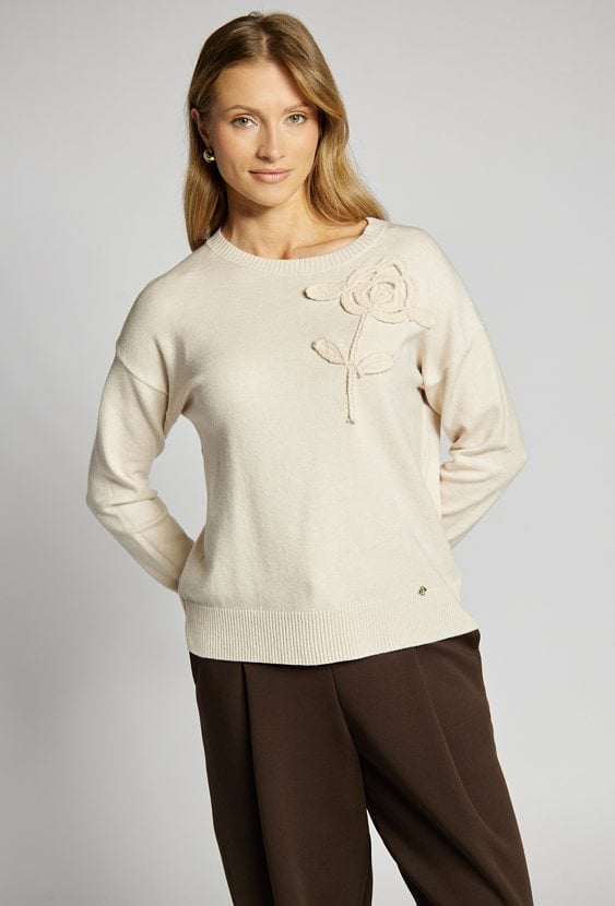 Sweter z kwiatem