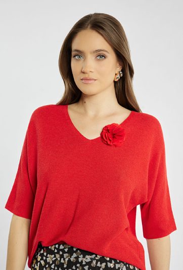 Sweter damski z agrafką