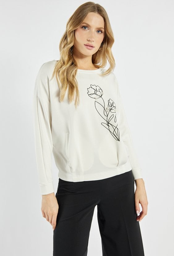 Bluza z ozdobnym kwiatem