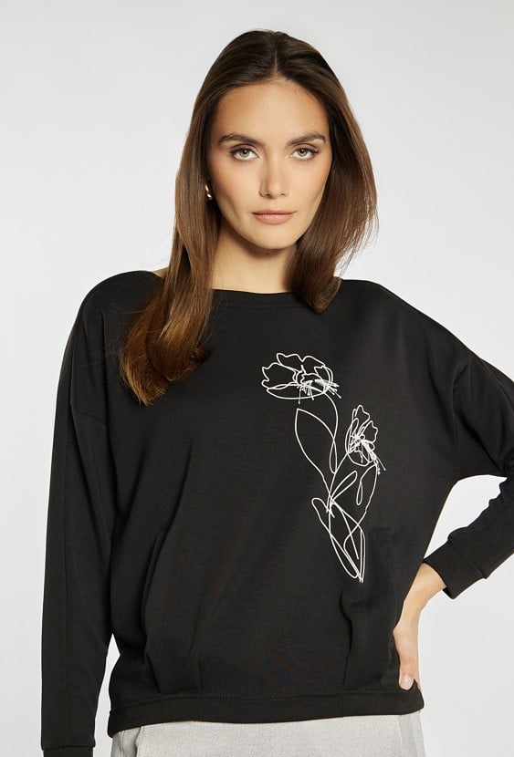 Bluza z ozdobnym kwiatem