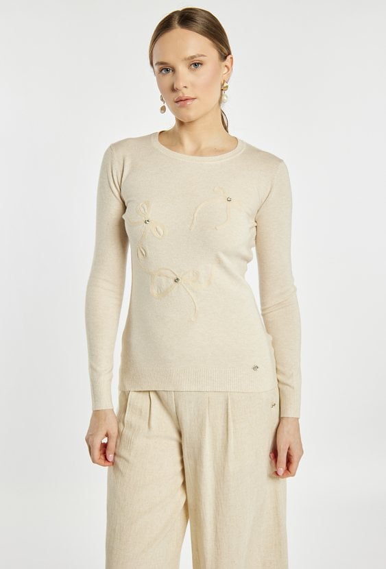 Sweter z kokardkami