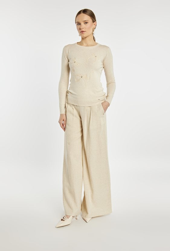 Sweter z kokardkami