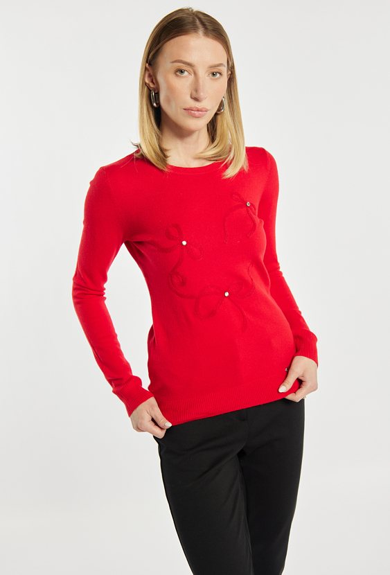 Sweter z kokardkami