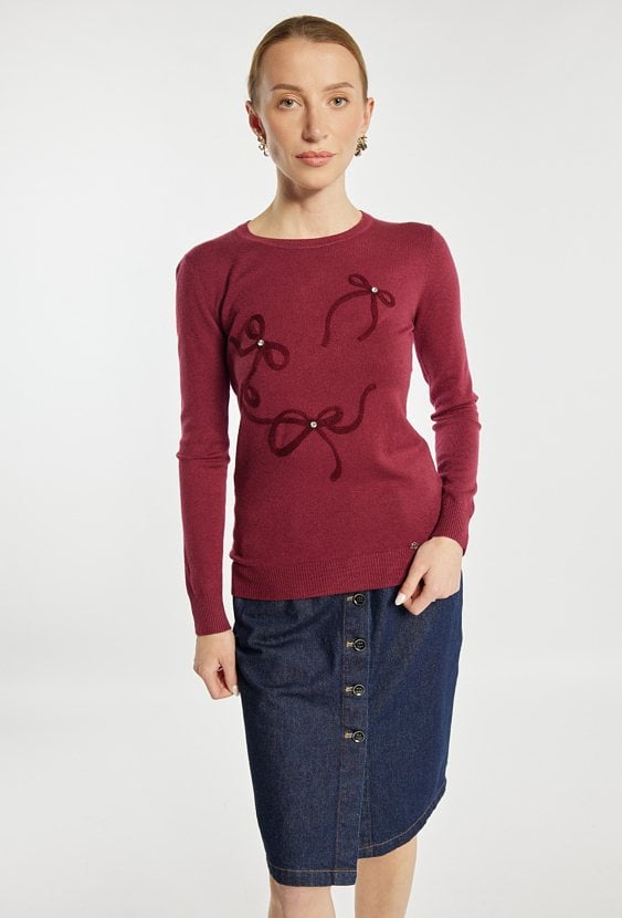 Sweter z kokardkami