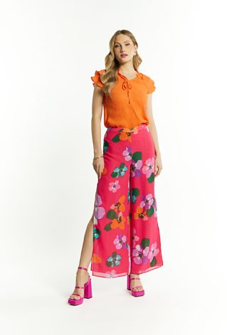 Wzorzyste spodnie z rozcięciem