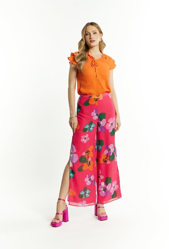 Wzorzyste spodnie z rozcięciem