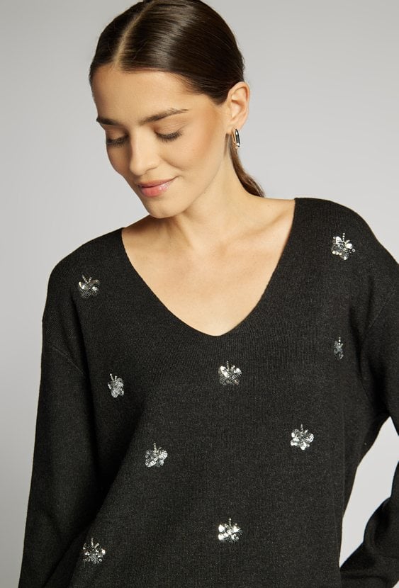 Sweter z aplikacjami