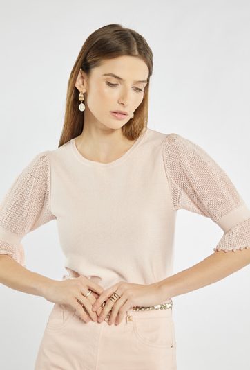 Elegancki sweter z bufkami