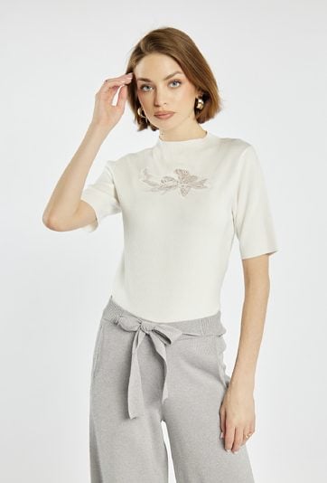 Elegancki sweter z haftem kwiatowym