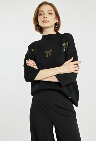 Sweter z błyszczącymi kokardkami