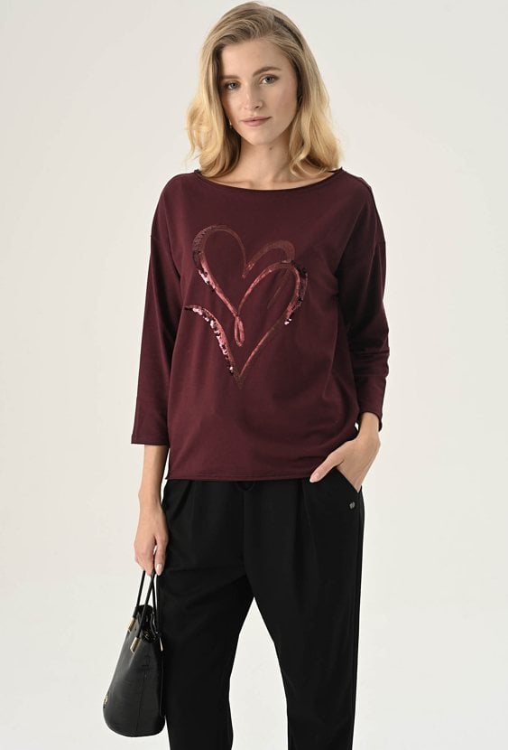 Bluza z cekinową aplikacją