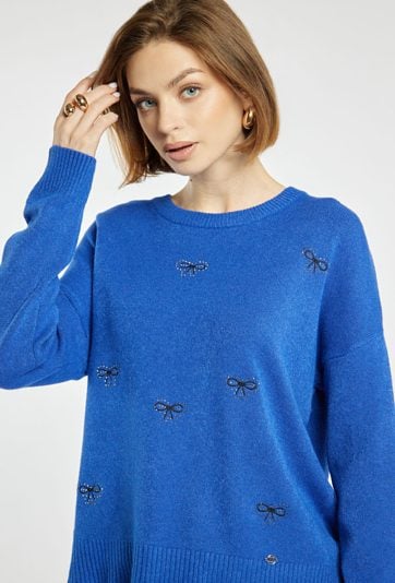 Sweter damski w kokardki