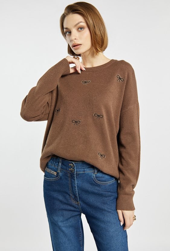 Sweter damski w kokardki