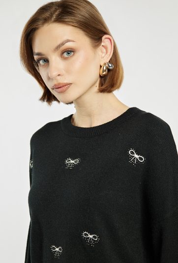 Sweter damski w kokardki