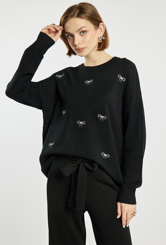 Sweter damski w kokardki