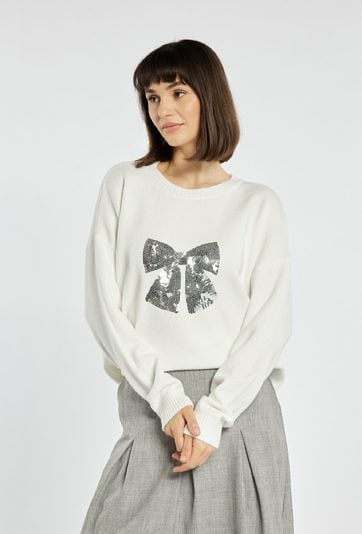 Sweter z cekinową kokardą