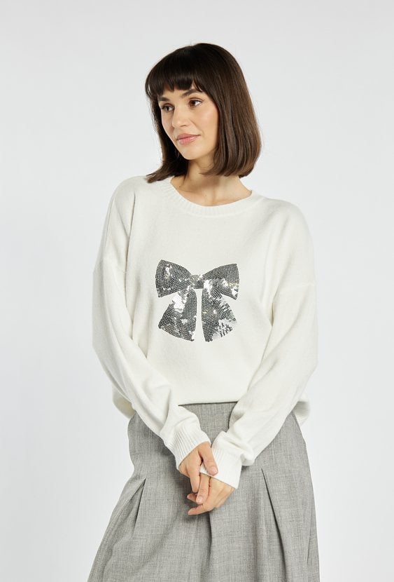 Sweter z cekinową kokardą