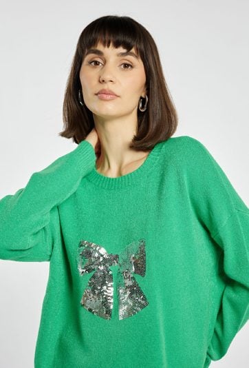 Sweter z cekinową kokardą