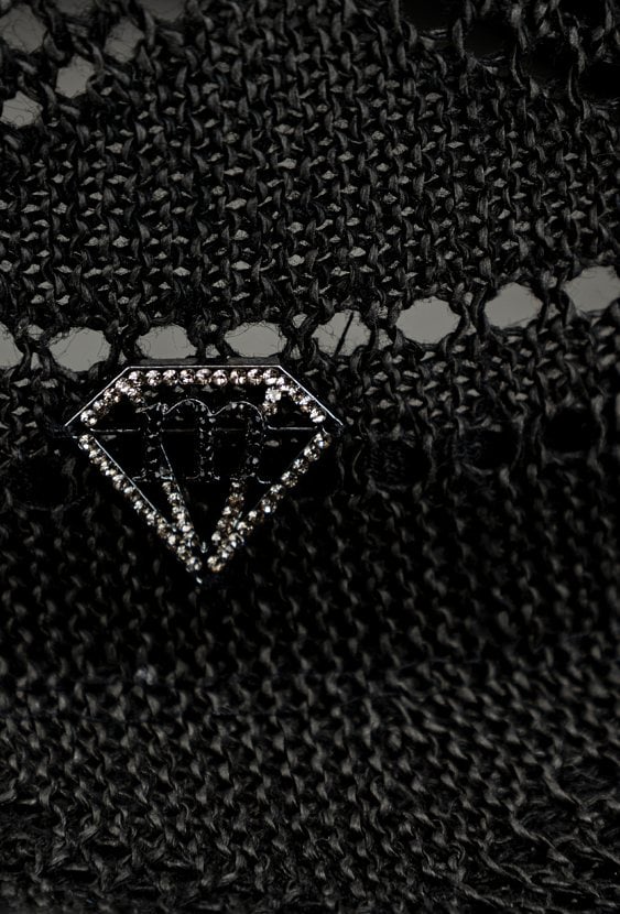 Czarny kapelusz z plecionką