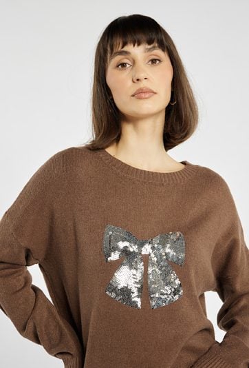 Sweter z cekinową kokardą