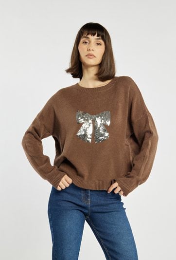 Sweter z cekinową kokardą