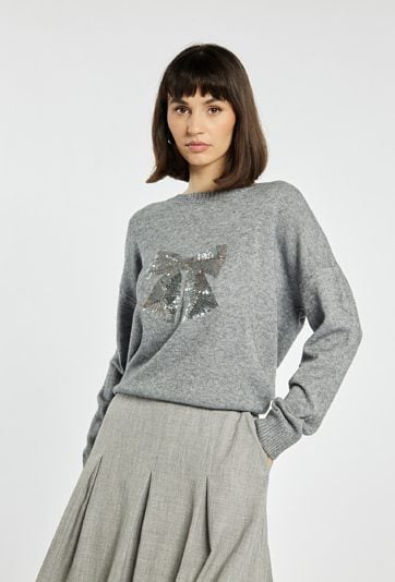 Sweter z cekinową kokardą