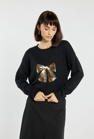 Sweter z cekinową kokardą