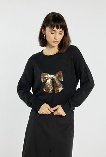 Sweter z cekinową kokardą