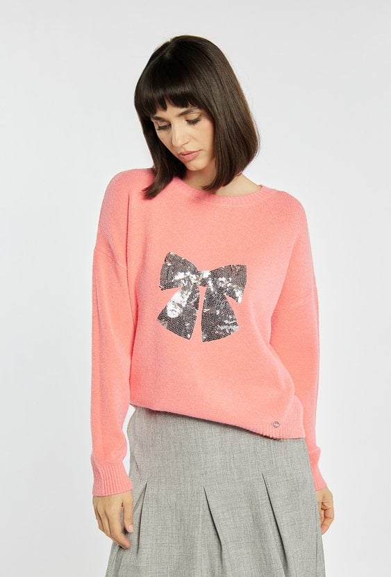 Sweter z cekinową kokardą