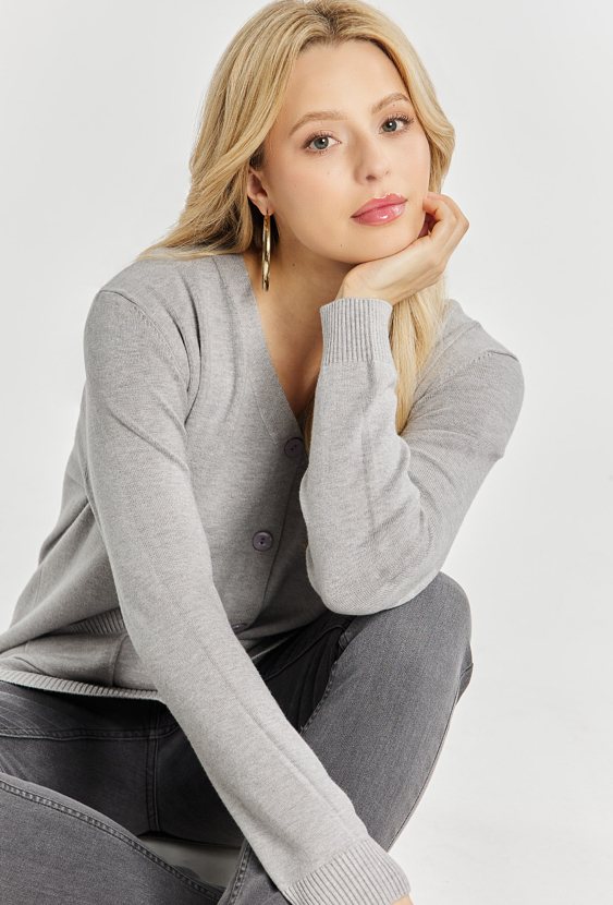 Sweter damski z kieszeniami