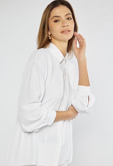 Koszula z asymetrycznym dołem