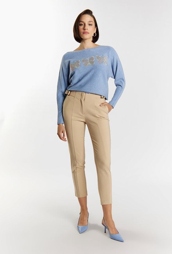 Materiałowe spodnie z ozdobnymi klamrami