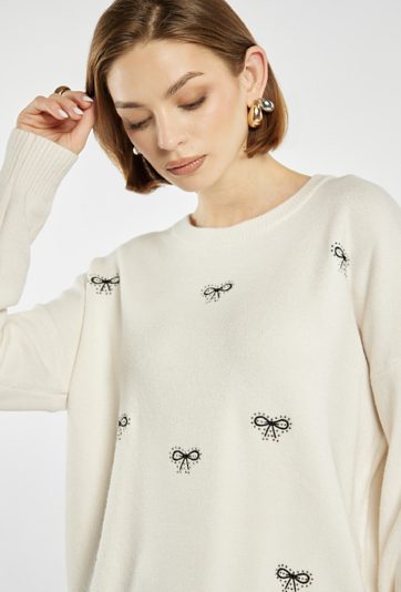 Sweter damski w kokardki