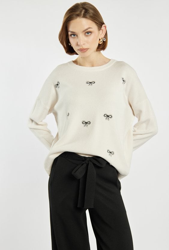 Sweter damski w kokardki