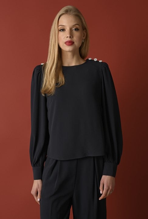 Niebieska bluzka z biżuteryjnymi guzikami